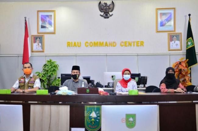 Plh Sekdaprov Riau Hadiri Rakor PPKM Mikro dan Posko Covid-19 Tingkat Desa Kelurahan Secara Virtual